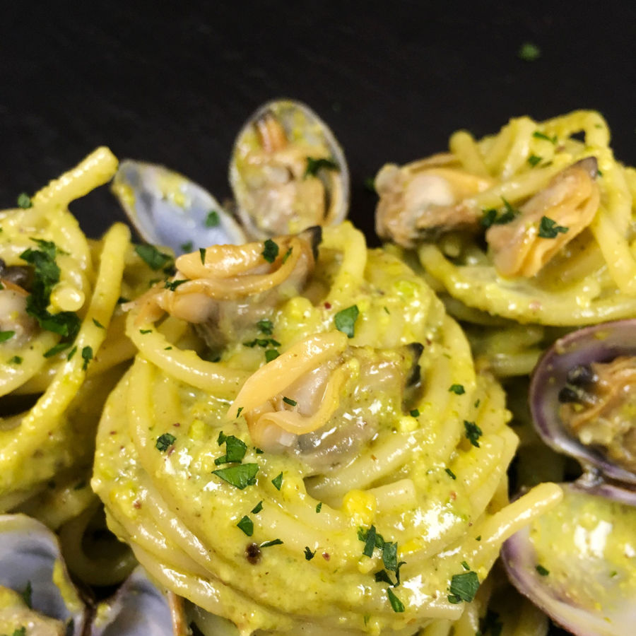 From Italy Nonna's Clam Spaghetti with Pistachio Pesto.